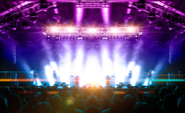 istock Concert crowd in front of a live stage 1186188119