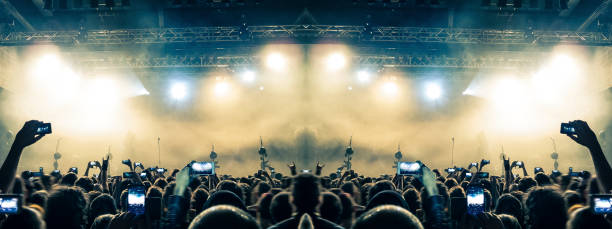 istock Filming concert on smart phone 1186188125