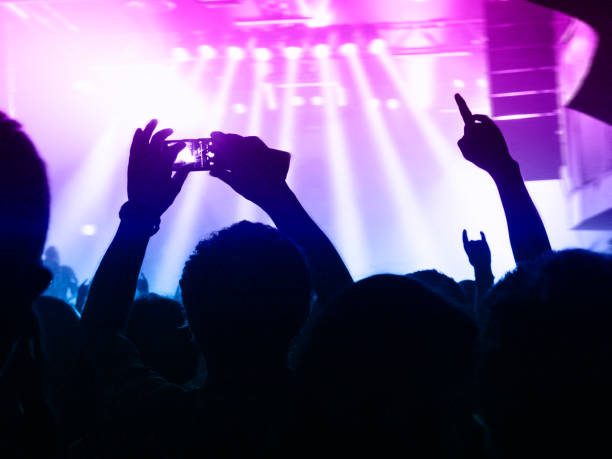 istock Filming concert on smart phone 1186188134