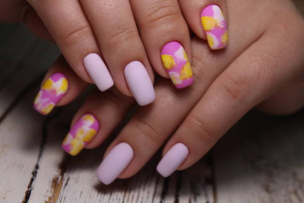 istock fashionable beige manicure with a silver design 1186188302