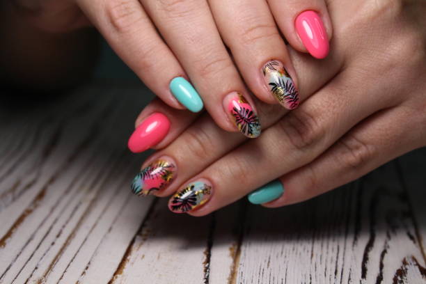istock stylish design of manicure on beautiful nails 1186188600