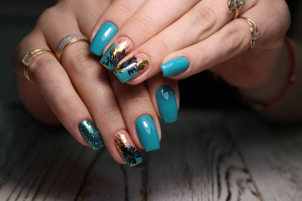 istock fashionable beige manicure with a silver design 1186188639
