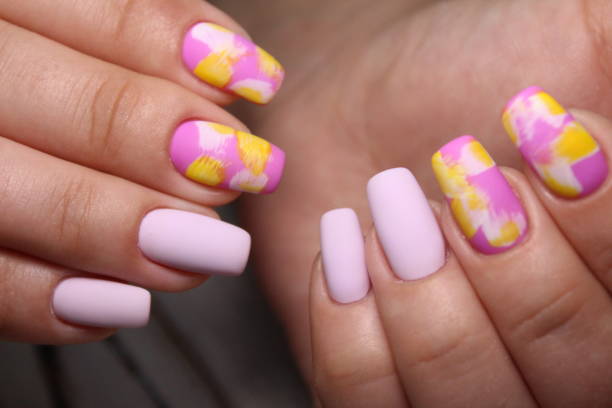 istock stylish design of manicure on beautiful nails 1186188742