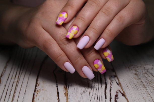 istock stylish design of manicure on beautiful nails 1186188752
