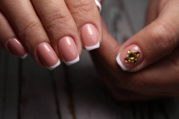istock Trendy manicure design on a beautiful background. 1186190335