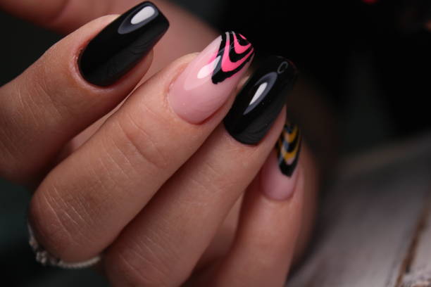 istock Beautiful nail design on female hands on background. 1186191286