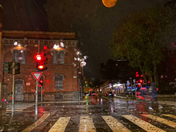 istock Drive car by night with rain 1186193724
