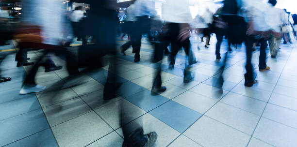 istock Commuters Walking Through Pedestrian Walkway Busily 1186195266