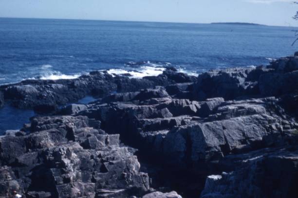 istock Black Rock Formation Near Sea During Daytime 1186203794
