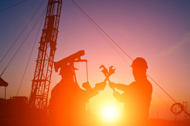 istock The oil workers in the job 1186206542