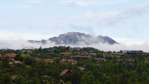 Granite Mountain Shrouded in Morning Clouds stock photo