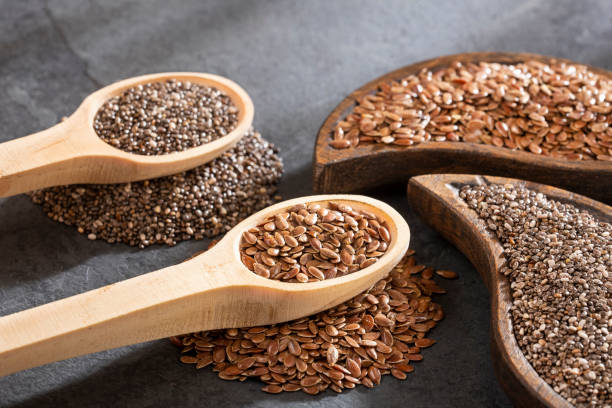 Vegan Omega 3 Source. Linseed and Chia seeds Vegan Omega 3 Source. Linseed and Chia seeds salvia hispanica plant stock pictures, royalty-free photos & images