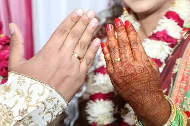 Hindu wedding ritual wherein bride and groom hand over their rings to each others as symbol of love