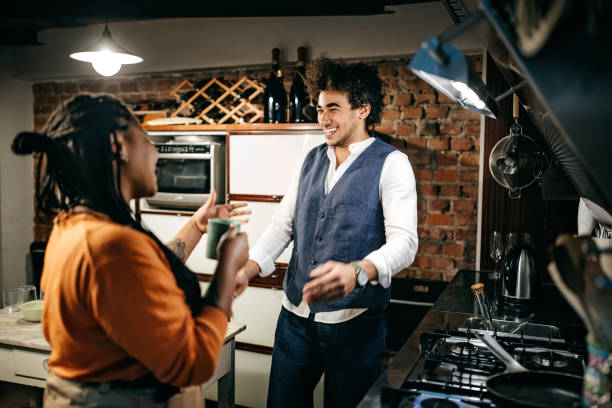 istock Multi-ethnic couple of roommates preparing breakfast 1186214920