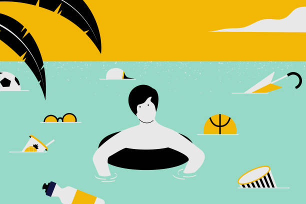 istock Man swimming on swim ring in the sea among plastic trash 1186215563
