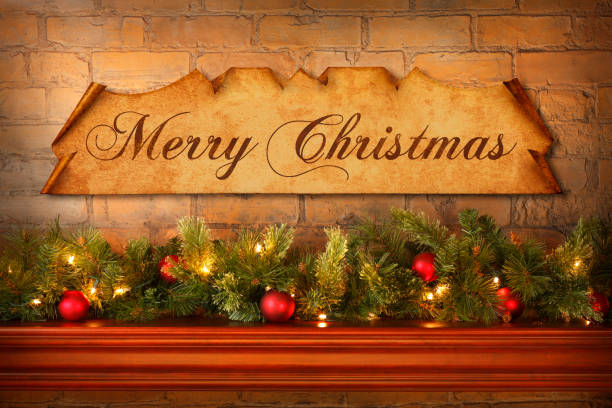 istock Merry Christmas Sign Hanging On Wall Above Mantelpiece 1186218933