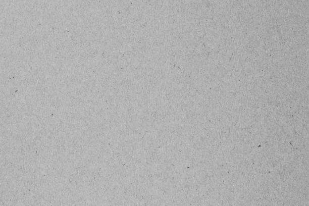 istock Gray paper cardboard, craft sheet. Wrapping paper texture. Packaging pattern. Natural sheet surface. 1186222358
