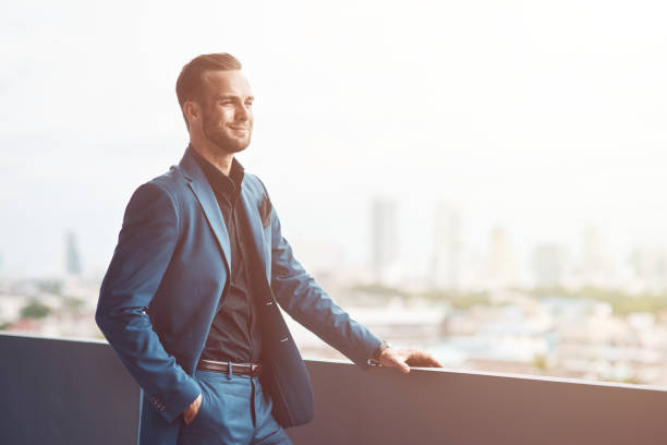 istock Confident handsome businessman enjoying the city view 1186222359