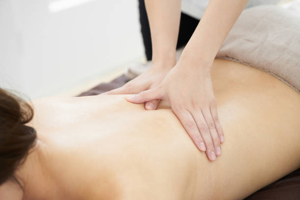 istock Woman receiving back massage 1186228219