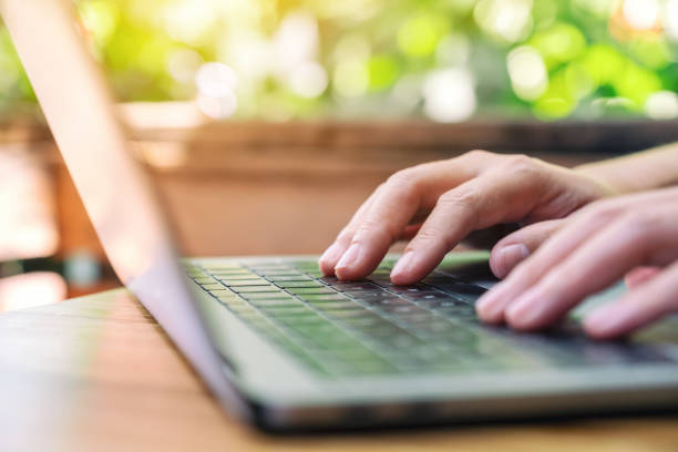 istock a woman working and typing on laptop computer on the table 1186231262