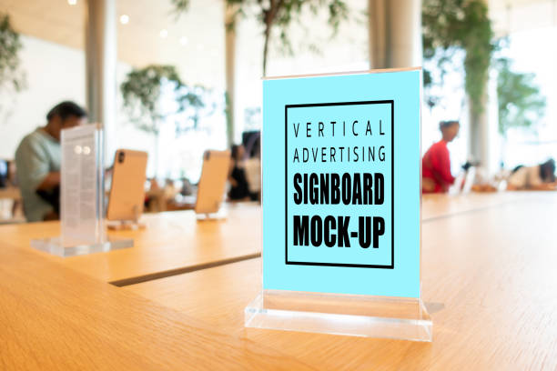 istock Mock up vertical advertising signboard acrylic frame in smartphone shop 1186238758