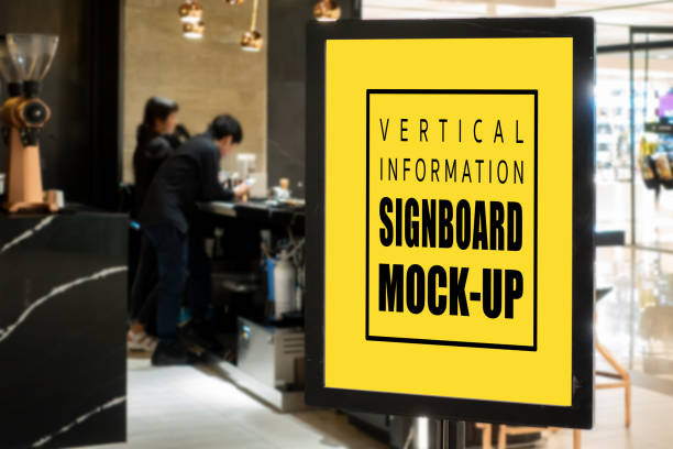 istock Mock up signboard in black frame standing at coffee shop 1186239838