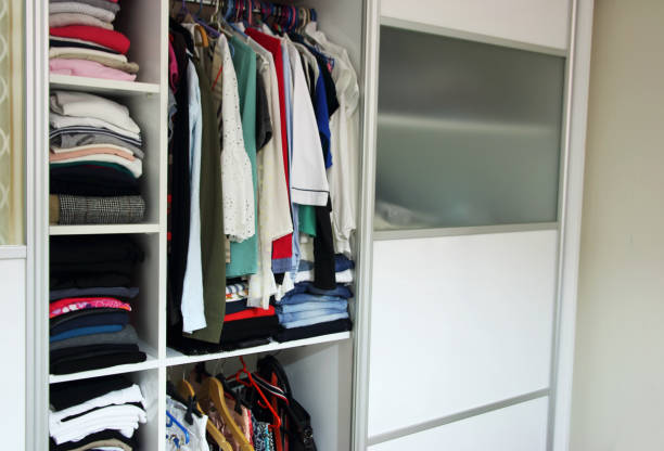 istock Modern wooden wardrobe with clothes 1186241460