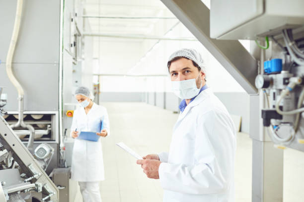 istock Technologist man at food factory . 1186248279