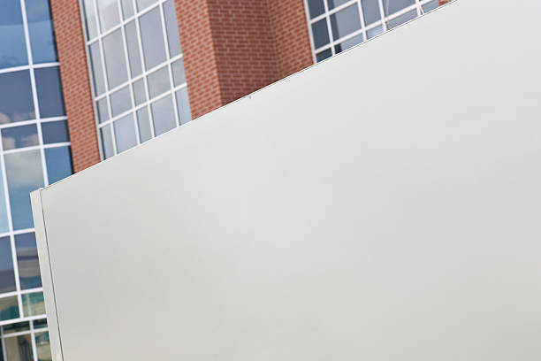 istock Large blank sign in front of office building 118625011