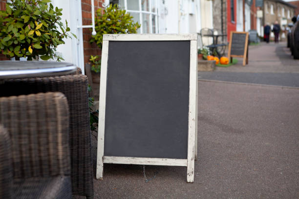 istock Sidewalk chalkboard street sign 1186252531