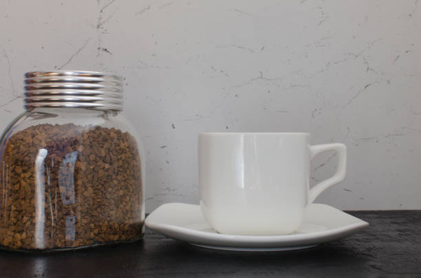 istock Glass jar of coffee 1186255624