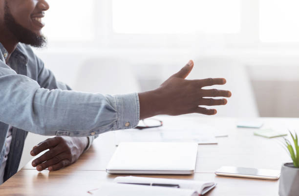istock Black entrepreneur giving hand for handshake proposes partnership 1186255751