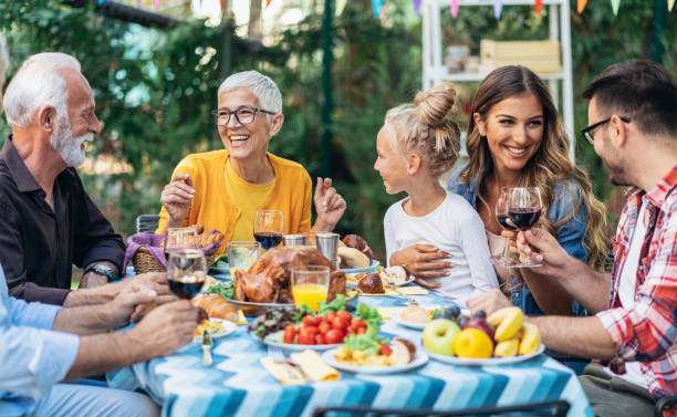 istock Happy family celebrating Thanksgiving day 1186257567