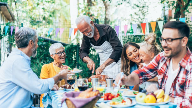 istock Happy family celebrating Thanksgiving day 1186257569