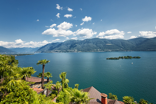 The canton Ticino in Switzerland is a travel destination especially in summertime. Wonderful panoramic view over Lago Maggiore with the island of Brissago.