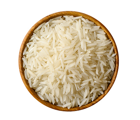 Basmati de arroz largo blanco seco aislado sobre fondo blanco. photo