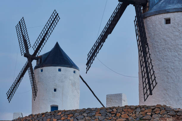 istock Traditional antique windmills at sunset in Spain. Consuegra, Toledo 1186269365
