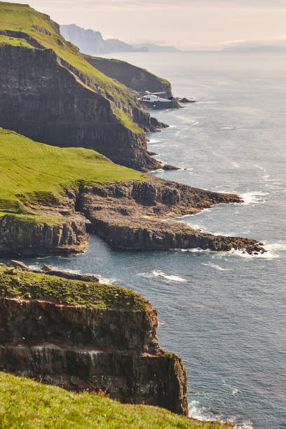 istock Helicopter flying over mykines atlantic cliffs in Faroe islands. Transportation 1186270788