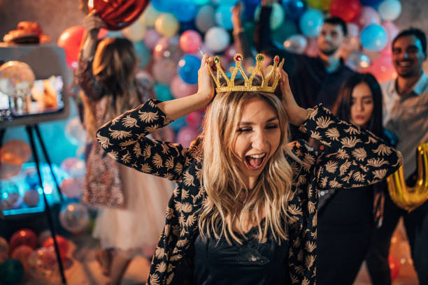 istock Woman having fun at a party 1186271018