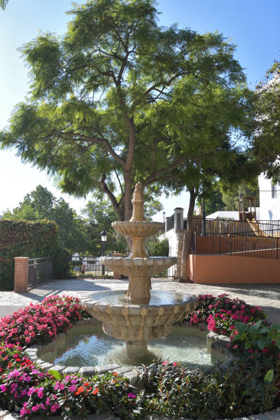 istock Andalusian public fountain in a typical park, Torrox, Spain 1186271914