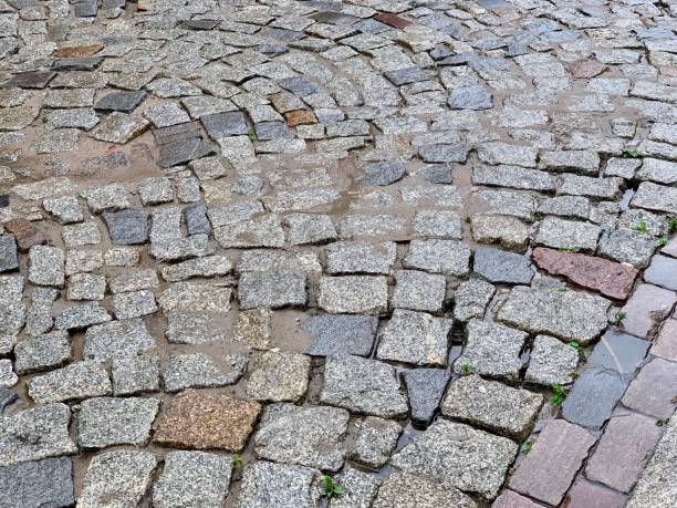 istock old stone tiles on the road 1186273119