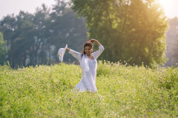 istock Happy Woman Enjoying Nature 1186278628
