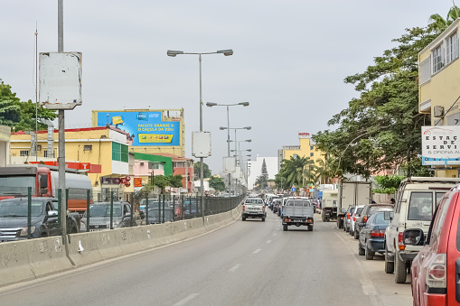 Luanda/Angola - 11/28/2016: View of samba road in the city center with people, vehicles and buildings