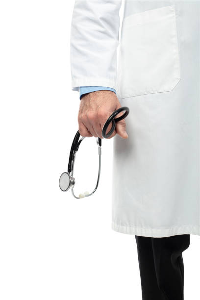 istock Cropped Image Of Doctor Holding Stethoscope Against White Background 1186282481