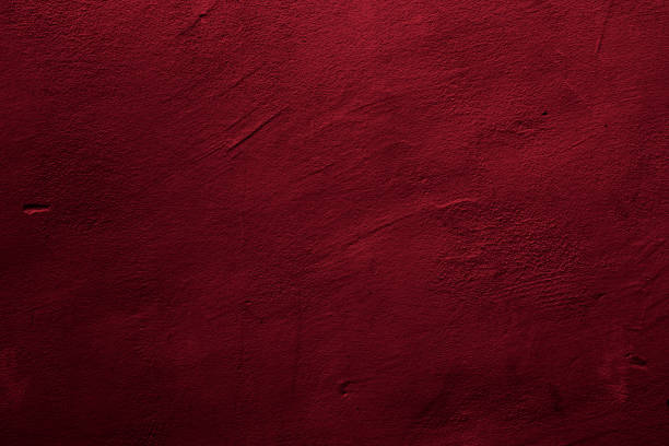 fondo texturizado abstracto en rojo - burgundy fotografías e imágenes de stock