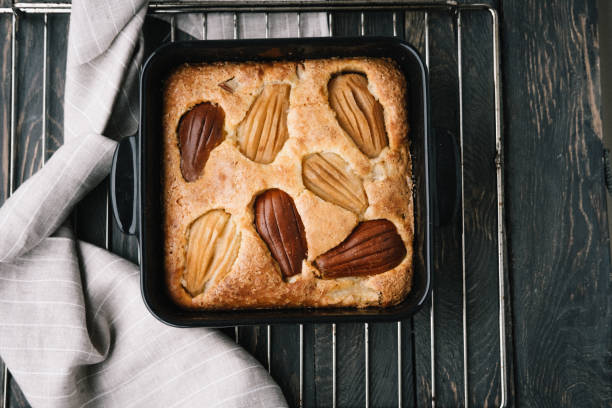 Fall french pear cake in a black ceramic bakeware