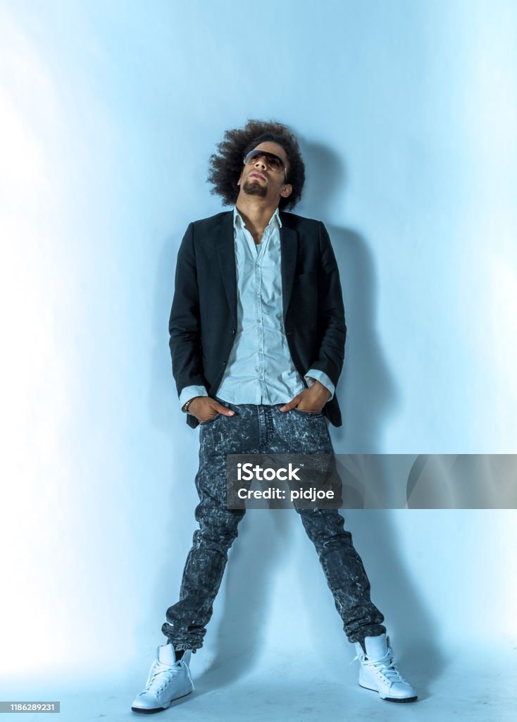 Agile Dj With An Afro Hairstyle Stock Photo - Download Image Now - Men,  Cool Attitude, Casual Clothing - iStock