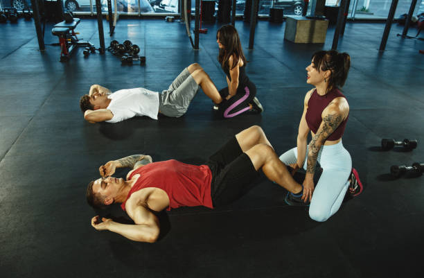 istock A group of muscular athletes doing workout at the gym 1186289907