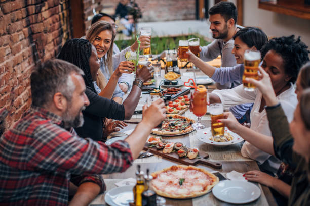 istock Friends sitting together in restaurant 1186294681