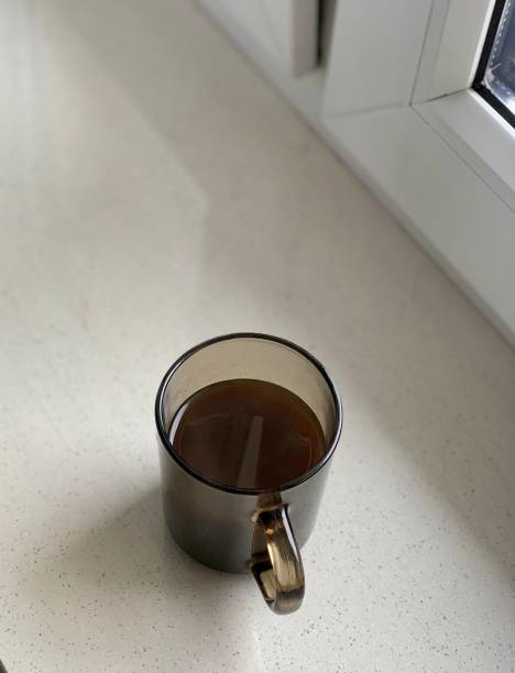 istock cup of coffee on the windowsill 1186294784